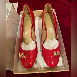 Patent leather red Michael Kors pumps